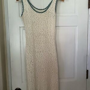 Elegant Cream Sleeveless Dress with Blue Trim